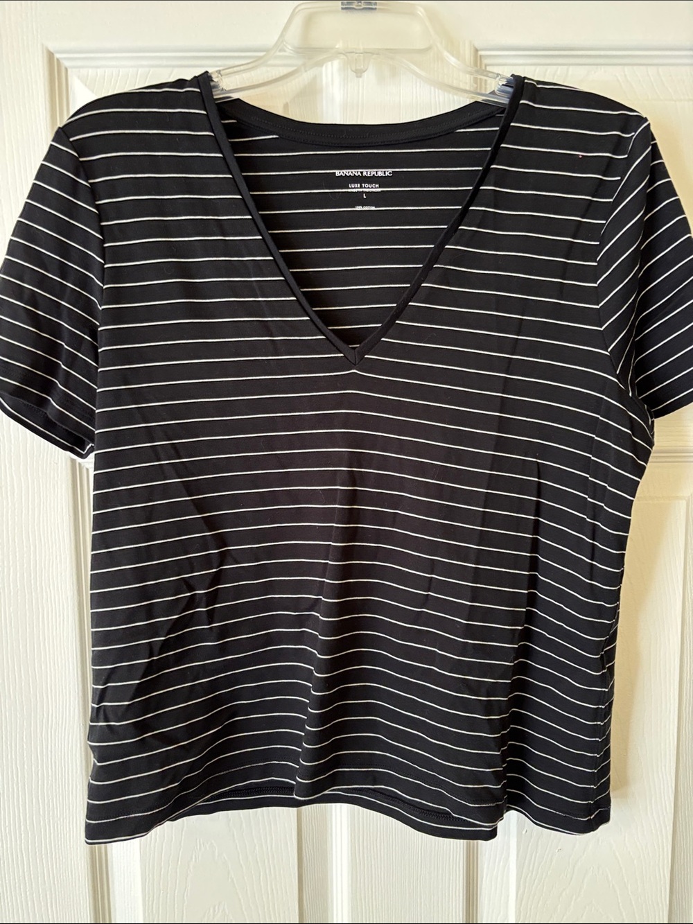 Banana Republic Black and White Striped V-Neck Tee. Slightly cropped length.